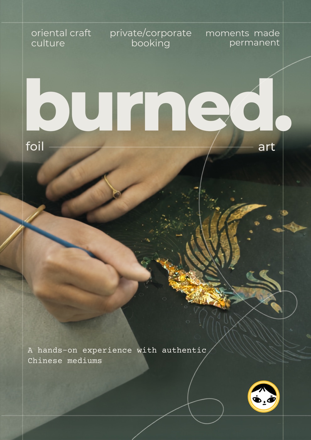 Burned foil art poster: hands laying gold leaf into a phoenix design